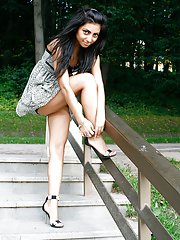 Some of her shoots here feature girl getting barefoot in a park and just soaking in the warmth and softness of the summer grass. With her shoes standi
